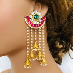 Multicolor Jadau Kundan Jhumka/ Pachi Kundan Jhumka/ Sabyasachi Kundan Earrings/ Punjabi Kundan Earrings/ Jadau Indian Traditional Earrings Features Fine Kundan earrings with 22 K gold plating Handcrafted To Perfection Light Weight Earrings Earring length- approx. 4 inches Comes with Push Back Closure Made in Brass Facebook: www.facebook.com/shoparyafashions Pinterest: www.pinterest.com/aryafashions Instagram: www.instagram.com/shoparyafashions Twitter: www.twitter.com/aryafashions Email: info@a Temple Jewelry Chandbalis With Latkans, Temple Jewelry Jhumkas With Latkans For Diwali, Temple Jewelry Style Chandbalis With Latkans, Diwali Temple Jewelry Jhumkas With Latkans, Temple Jewelry Jhumkas With Latkans For Festivals, Temple Jewelry Style Jhumkas With Latkans For Festivals, Traditional Cutdana Dangle Jhumkas, Traditional Dangle Jhumkas, Traditional Chandbali Jhumkas With Latkans