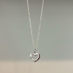 Nwot Sterling Silver Coach Necklace Approx 17” Beautiful! Classic Heart-shaped Sterling Silver Necklace, Silver Dainty Heart Necklace, Sterling Silver Necklace With Heart Detail In Silver, Silver Heart Pendant Necklace With Heart Detail, Silver Necklace With Heart Detail, Dainty Silver Heart Necklace, Classic Everyday White Gold Heart Necklace, Silver Heart Necklace With Delicate Chain, Classic White Gold Heart Necklace For Everyday