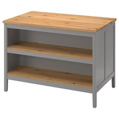 a wooden shelf with two shelves on each side