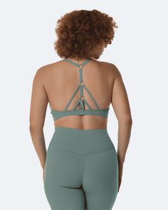 The perfect blend of fashion and functionality that will catch everyone’s eye. This top goes with everything, but match it with our body-shaping leggings and it's game over! Cross Front Top, Green Bike, Fresh Green, Bike Shorts, Criss Cross, Fabric Material, Breathable Fabric, Everyday Wear, Sports Bra