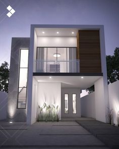 a modern house with an open floor plan and balcony area at night in the evening