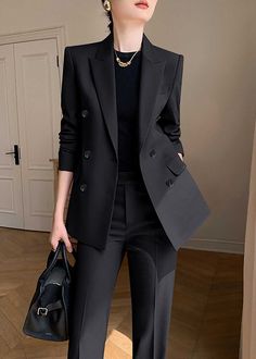 Elevate your professional wardrobe with the Monica Black Pants Suit Two-Piece Set. Crafted with a sophisticated black hue and double-breasted closure, this set exudes luxury and exclusivity. The straight-leg pants and tailored blazer provide a timeless and tasteful look for any business occasion. Blazer: Double Breasted closure Notched lapels Long sleeves Front flap pockets Pants Zip fly with button closure Side slant pockets Regular length - Polyester, spandex- Item #43197- Women's blazer & pan Black Double Breasted Blazer, Black Pant Suit, Pockets Pants, Professional Wardrobe, Pants Suit, Tailored Blazer, Breasted Blazer, Double Breasted Blazer, Dress Pant