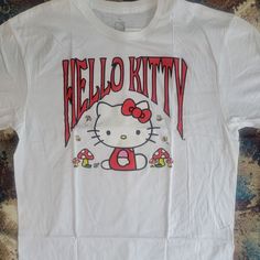 Unisex Hello Kitty By Sanrio White Graphic Tee Shirt With Mushrooms And Bees Nwt. We Have A Bunch Of Hello Kitty In Our Closet So Bundle Up For A Deal Hello! Welcome To This4that. I Do My Best To Accurately Describe Each Item. There Are Times That I May Miss Something. I Assure You That It Is Not Intentional. If You Have Any Questions, Please Message Me. If You Have Problems After Purchase, Please Contact Me Immediately Before Leaving Neutral Or Negative Feedback. Items Come From A Non-Smoking H Cotton Hello Kitty Fun Tops, Hello Kitty Summer Tops, Hello Kitty Summer Fun Tops, Summer Cotton Hello Kitty Tops, Hello Kitty Fun Summer Tops, Fun Cotton Tops With Hello Kitty, Summer Hello Kitty Fun Tops, Fun Hello Kitty Print Summer T-shirt, Hello Kitty Short Sleeve Tops For Summer