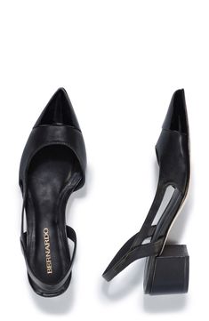 A pointy cap toe and half d'Orsay silhouette bring visual intrigue to a slingback leather pump set on a cushioned footbed and wrapped block heel. 1 3/4" heel Elasticized slingback strap Cushioned footbed Leather upper, lining and sole Made in Brazil Black Slingback Pumps With Sculpted Block Heel, Black Low Heel Slingback Pumps With Branded Heel, Classic Slingback Pumps With Contrasting Heel For Evening, Sleek Black Slingback Pumps With Block Heel, Black Leather Slingback Pumps With Deep Heel Cup, Sleek Black Slingback Pumps With Deep Heel Cup, Sleek Black Slingback Pumps With Leather Sole, Sleek Black Block Heel Slingback Pumps, Black Slingback Pumps With Block Heel For Evening