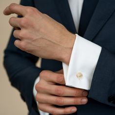 These 14k gold cufflinks are perfect for everyday wear or for special occasions. 14k yellow gold or white gold Each Cufflink weighs 18 grams, totaling 36 grams for the pair Diameter is 0.5 inches 1.5mm thickness Sold as a pair Includes your choice of either a laser or hand engraved monogram in all caps in a serif font - up to 3 characters only Read more about the classic cufflinks design here Please allow 6-8 weeks for production as this piece is made to order just for you