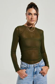 PAXTON RAW HEM LONG SLEEVE MESH TEE IN OLIVE – AKIRA Style With Cargo Pants, Green Mesh Top, Style With Cargo, Green Sheer Top, Chic Top, Going Out Tops, Rounded Neckline, Green Tops, Sheer Top