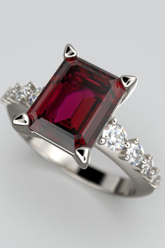 Italian Gold engagement ring with natural Rhodolite garnet emerald cut and natural Diamonds, made in Italy in 14k or 18k gold by Oltremare Gioielli. Italian Engagement Ring, Italian Engagement, Garnet And Diamond Ring, Rhodolite Garnet, Diamonds And Gold, Gold Engagement Ring, Gold Engagement, Gold Engagement Rings, Real Gold