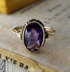 Beautiful 1950s vintage silver amethyst ring, US Size 6 1/2, in good vintage condition. Box on the photos not included! Diameter: approx. 14 mm (0.5 inch) Material: 925 silver, amethyst total weight: 3 g US Size: approx. 6 1/2 (EU size 53 1/2) A stunning religious shop well worth a visit ... https://etsy.me/2NNNK4g Vintage Silver Amethyst Ring Gift, Adjustable Vintage Sterling Silver Amethyst Ring, Vintage Cabochon Amethyst Ring Gift, Antique Sterling Silver Hallmarked Amethyst Ring, Vintage Silver-toned Amethyst Ring Gift, German Silver, Multi Stone, 1950s Vintage, Multi Stone Ring