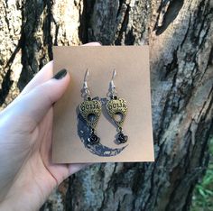 Handmade earrings made from brass colored ouija planchette charms, black rose charms, and silver earring hooks. Gothic Coffin, Spooky Aesthetic, Ouija Planchette, Aesthetic Jewelry, Earring Hooks, Silver Earring, Brass Color, Black Rose, Handmade Earrings