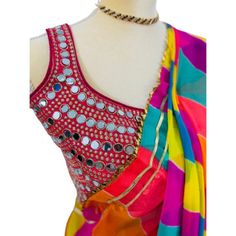 Contemporary multi colored saree that fits any occasion. Ideal as festive wear, wedding wear, casual or cocktail dine in.  this 5.5 meters of elegance as beautiful detailing with exclusive Gota Patti work from Rajasthan to enhance the look. The leightweight and soft material makes it very easy to drape and carry. Comes with very contemporary unstiched blouse material which can be mix and matched with other outfits. Navratri Multicolor Pre-draped Saree With Gota Work, Multicolor Pre-draped Saree With Gota Work, Festive Multicolor Chanderi Pre-draped Saree, Festive Multicolor Pre-draped Saree With Unstitched Blouse, Bollywood Style Multicolor Pre-draped Saree For Navratri, Bollywood Multicolor Pre-draped Saree For Navratri, Multicolor Semi-stitched Pre-draped Saree With Dori Work, Summer Multicolor Georgette Pre-draped Saree, Traditional Drape Saree With Mirror Work For Summer