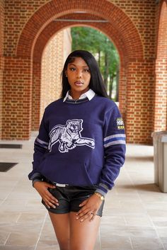 Wrap yourself in comfort and pride with our HBCU Cotton Chenille Logo Sweater. This sweater effortlessly combines cozy comfort with collegiate style, making it an essential addition to your wardrobe. Key Features: Premium Cotton Fabric: Made from high-quality cotton, this sweater offers exceptional softness and breathability, ensuring all-day comfort.Chenille Logo: The front features a beautifully crafted chenille logo that adds a touch of texture and sophistication, proudly displaying your HBCU Fall Varsity Sweatshirt, Collegiate College Tops With Embroidered Logo, Collegiate Tops With Embroidered Logo For College, Navy Top With Embroidered Logo For College, Collegiate Long Sleeve Sweater For Game Day, Collegiate Sweater For Game Day, Relaxed Fit College Style Sweater For Fall, Relaxed Fit Sweater For Fall In College Style, Casual Style Relaxed Fit Sweater For Fall