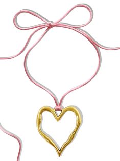 It's no surprise how this dreamy choker earned its name... You'll fall in love every time you look at it! Featuring the dreamiest pink satin cord and stunning statement-making heart pendant, the 'LOVE AT FIRST SIGHT' wrap choker is the necklace you've been waiting for. Trust us, compliments are waiting... Available in silver zinc alloy and 18K antique gold. Waterproof & rust-free. Made with genuine satin cord. 55" length - designed to allow you to tie this piece in multiple ways. Handmade with l