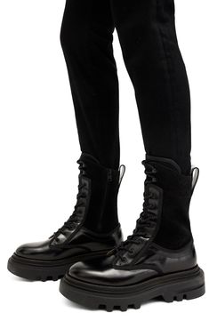 Take your off-duty style to the next level with this leather-and-suede lace-up boot grounded by a sturdy lug sole. 2 1/4" heel; 1 1/2" platform 9 1/4" shaft Lace-up style; side zip closure Leather upper and lining/synthetic sole Made in Portugal High-top Calf Leather Boots With Lace-up Fastening, Black Leather Boots With Front Lace-up Fastening, Leather High-top Boots With Lace-up Fastening, High-top Leather Boots With Lace-up Fastening, Leather Platform Boots With Lace-up Fastening For Streetwear, Black Leather Combat Boots With Lace-up Fastening, Lace-up Calf Leather Moto Boots With Rubber Sole, Leather Platform Boots With Front Lace-up For Streetwear, Lace-up Calf Leather Boots With Vibram Sole