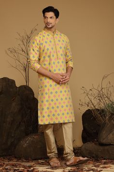 Yellow or Ivory Multi Printed Blended Silk Kurta Set Traditional  Wear  Care Instructions: Dry Clean Blended silk kurta with Stichline & front potli placket. Top Details: Color-Yellow or Ivory Multi Printed, Fabric - Blend slik Bottom Details Color - Antick Gold, Style - free size Chudidar, Fabric -Dhupion Silk Package Include: Kurta and Pajama Additional Information : - As this Sherwani/Waistcoat/Kurta is stitched & made as per orders requested only, So there is NO RETURN & NO EXCHANGE on this Yellow Chanderi Sherwani Straight Kurta, Diwali Printed Chanderi Nehru Jacket, Diwali Chanderi Nehru Jacket With Printed Motifs, Diwali Nehru Jacket With Printed Motifs In Chanderi, Traditional Yellow Chanderi Sherwani, Festive Chanderi Sherwani With Printed Motifs, Yellow Chanderi Sherwani With Traditional Drape, Semi-stitched Yellow Kurta For Transitional Season, Yellow Chanderi Sherwani With Chikankari Embroidery