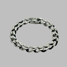 Twisted Chain Link Bracelet length: 8.5 inches width: 10mm thickness: 3mm clasp : fold over material: 304 stainless steel Classic Stainless Steel Jewelry In Gunmetal, Stainless Steel Link Bracelets For Formal Occasions, Classic Stainless Steel Chain Bracelet For Formal Occasions, Classic Stainless Steel Chain Link Bracelet, Tarnish Resistant Stainless Steel Chain Link Bracelets, Classic Stainless Steel Chain Bracelet With Polished Finish, Formal Stainless Steel Silver Chain Bracelets, Formal Metal Cuban Link Bracelet, Adjustable Stainless Steel Chain Bracelet