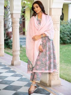 A poetic rendetion of a summer festive collection that makes you nostalgic, in classic luminous block prints. Handcrafted on a bed of fine cotton, mul and doria in hues of pastels. Perfect for light occasions. A set of 3 consists of kurta, pants & dupatta. Kurta: Summery florals combined with the most delicate silhouette inspired by the vintage bhopali grey kurta. This round neck, side gathered ghera kurta in cotton with loop button and gota detailing is a summer staple . Finished with hand prin Grey Kurta, Kurta Pants, Festive Collection, Summer Staples, Kurta Set, Grey Floral, Floral Printed, Block Print, Printed Cotton