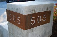 a cement block with the number 505 on it