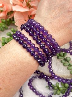 dark-purple-amethyst-bracelet Amethyst Stretch Bracelet With Round Beads For Gift, Purple Gemstone Beads Stretch Bracelet As Gift, Spiritual Purple Crystal Bracelet, Lavender Amethyst Beaded Bracelets For Meditation, Purple Stretch Bracelet With Gemstone Beads As Gift, Amethyst Stretch Bracelet With 8mm Beads As Gift, Spiritual Purple Crystal Bracelet For Meditation, Amethyst Beaded Stretch Bracelet, Amethyst Beaded Stretch Bracelet With Round Beads