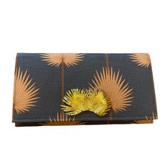 Garland Bags have a cult following and by the looks of this Palm clutch we understand why! The color combination of chocolate brown and cinnamon with the gold palm embellishment make this clutch a showstopper! Designer Brown Clutch With Removable Pouch, Brown Rectangular Wallet For Evening, Luxury Brown Evening Bag As Gift, Chic Brown Evening Bag As Gift, Chic Brown Evening Bag For Gift, Evening Brown Pouch Wallet, Luxury Brown Clutch Evening Bag, Evening Wallets With Removable Pouch In Brown, Brown Evening Bag With Removable Pouch For Party