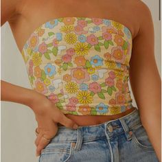 Trendy Floral Print Sleeveless Tube Top, Yellow Sleeveless Tube Top For Summer, Yellow Summer Style Tube Top, Multicolor Floral Print Tube Top For Spring, Spring Bandeau Tube Top With Floral Print, Multicolor Floral Print Strapless Tube Top, Multicolor Strapless Floral Print Tube Top, Spring Multicolor Floral Print Tube Top, Strapless Multicolor Floral Print Tube Top