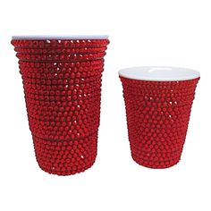 two red cups are sitting next to each other