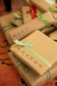 many wrapped presents are stacked on top of each other with the word marry written on them