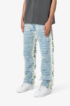 the V631 Allover Frayed Denims are designed with a baggy fit throughout, featuring a vintage wash, exposed and raw seams throughout, and finished off with raw hem. details relaxed fit* 100% cotton zipper at inseam model is 6’1, 140 lbs and wears a size 30 Blue Ripped Cotton Cargo Jeans, Ripped Blue Straight Leg Cargo Jeans, Ripped Cotton Bottoms In Washed Blue, Distressed Blue Straight Leg Cargo Jeans, Urban Distressed Denim Blue Flare Jeans, Urban Style Distressed Denim Blue Flare Jeans, Urban Denim Blue Distressed Flare Jeans, Dark Wash Denim Pants With Frayed Hem, Distressed Blue Flare Jeans For Streetwear