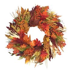 a wreath with autumn leaves and berries on it, isolated against a white background photo