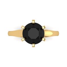 a black diamond ring with gold accents on the sides and an open band around it