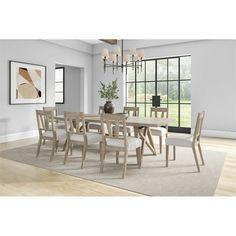 a dining room table and chairs in front of a large window with an area rug on the floor