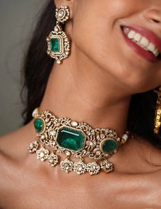 Stunning and gorgeous, CZ stones studded very fine quality Sabyasachi Victorian Emerald/Ruby/Spphire Doublet Stone Shoker necklaces with matching Earrings Antique Victorian Gold rhodium plated Earrings length: Approx 2 inches Earrings Closure: Pushback Necklace Closure: Adjustable Cord Highest quality and craftsmanship Customized orders takes 3 to 4 weeks, depending on piece requirements.  The Ombre Designs Jewelry pieces can be customized in accordance with your requirement.  Please Email or Wh Luxury Kundan Earrings With Stone Setting, Luxury Kundan Necklace With Matching Earrings, Real Gold Bridal Jewellery Indian, Indian Emerald Jewellery, Chandbali Jewelry For Diwali Reception, Bollywood Style Diamond Jewelry With Stone Work, Bollywood Style Jeweled Bridal Earrings For Reception, Fusion Style Jeweled Bridal Earrings, Fusion Style Jeweled Jewelry Sets For Wedding