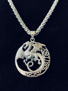 "Unique Handcast 925 Sterling Silver Celtic Dragon Warrior Pendant accented with Celtic Knotwork + Free 18\" long 316L non allergenic Surgical/Stainless Steel Cable Link Chain OR 18\" long 925 Sterling Silver Box Chain Longer chains available for a surcharge Chain Choices: Hypoallergenic 316L Surgical Stainless Steel Cable Link Chain (Picture#1) 925 Sterling Silver Box Chain (Picture#2) 925 Sterling Silver Rope Chain (Picture#3) 4mm thick Hypoallergenic 316L Surgical Stainless Steel Chainmaille Viking Style Sterling Silver Round Pendant Jewelry, Nickel-free Sterling Silver Viking Necklace, Viking Style Sterling Silver Nickel-free Necklace, Nickel-free Viking Style Sterling Silver Necklace, Nickel Free Viking Pendant Jewelry, Viking Style Silver Round Pendant Necklace, Nickel-free Viking Pendant Jewelry, Silver Viking Style Necklace For Gift, Silver Wheat Chain Necklace As Gift