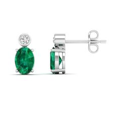 These exquisite emerald and diamond stud earrings are a timeless and elegant addition to any jewelry collection. The vibrant green emeralds are beautifully complemented by the sparkling diamonds, creating a stunning contrast that is sure to catch the eye. Metal: 14K Gold Setting Type: Prong Rhodium Finish: Yes, on White Gold Gemstone Details: Gemstone: Emerald Shape: Oval Average Dimensions: 7.00 x 5.00 MM Quantity: 02 Average Cut: Very Good Average Color: Medium to Dark Green Average Clarity: E Green Brilliant Cut Diamond Earrings, Emerald Earrings With Diamond Accents In Green, Green Diamond Earrings In Fine Jewelry Style, Green Diamond Earrings With Diamond Accents, Green Diamond Earrings Fine Jewelry, Anniversary Green Diamond Earrings, Classic Green Diamond Earrings With Accents, Emerald Diamond Earrings For Anniversary, May Birthstone, Emerald Green Diamond Earrings With Accents