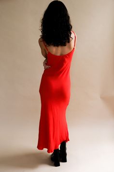 Shani Leo floor length maxi slip dress in red crepe. Cut on the bias to drape over your body in all the right places. Adjustable straps and beautiful raw hem. size 1 - 2/4 size 2 - 6/8 size 3 - 10/12 100% up-cycled rayon. #theplanetwillthankyou Sustainably and ethically produced in a family run factory in downtown Los Angeles, CA. Model is 5'9" and wearing a size 1. PIPE AND ROW Red V-neck Maxi Dress With Side Slits, Bias-cut Maxi Slip Dress For Date Night, Red Sleeveless Maxi Dress With Bias Cut, Red Maxi Length Slip Dress For Evening, Red Sleeveless Bias Cut Maxi Dress, Sleeveless Bias Cut Red Maxi Dress, Red Sleeveless Bias-cut Maxi Dress, Red Bias Cut Slip Dress For Summer, Red Bias Cut Maxi Dress For Evening