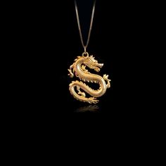 Unleash your inner fire with our Dragon pendant. Crafted with exquisite detail, this powerful piece embodies the untamed strength and mystique of the dragon, a symbol of wisdom and fierce protection. Feel the energy of this ancient guardian as it wraps you in its embrace, reminding you of your own unyielding spirit and the burning passion within. PENDANT INFORMATIONThis pendant is made of real, solid gold.• Made in USA• Material: 14k or 18k solid gold• Finish: polished• Height: 1.22" (31 mm) x W Mythological Style Yellow Gold Jewelry As Gift, Mythological Style Yellow Gold Jewelry Gift, Traditional Gold Jewelry With Dragon Design, Luxury Dragon Design Jewelry For Gift, Symbolic Gold Jewelry With Dragon Design, Spiritual Gold Jewelry With Dragon Design, Yellow Gold Jewelry With Dragon Design For Gift, Luxury Gold Necklaces With Dragon Design, Luxury Gold Jewelry With Dragon Design