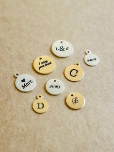 Perfect for adding a personalized letter or name charm to any necklace in the shop!  Engraved or hand stamped with the letter of your choice.   ITEM DETAILS  * Charms available in Gold Filled or Sterling Silver, as well as Gold Plated and Silver Plated. * Available sizes range from 8mm-11mm Hand stamped style: * stamped with the single letter of your choice. Upper case letters only, Stamped Font options shown in listing images * Space is limited to a single letter * the stamp does show through t Personalized Initial Pendant Charms As Gift, Personalized Initial Pendant Charms For Gifts, Personalized Initial Pendant Charms, Minimalist Personalized Initial Pendant Charms, Customizable Gold Charms For Personalized Gift, Initial Pendant Charms For Personalized Gift, Initial Pendant Charms For Gifts, Initial Pendant Charms As Gift, Gold Monogram Charms For Gifts