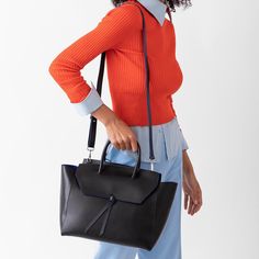 Are you ready to be that stylish woman who walks into the office with one leather tote that does it all? The Loren Tote is the ultimate everyday work bag because it’s made with our signature lightweight Italian leather that holds its shape over time, doesn’t scratch and is easy to clean. Plus, it’s spacious, stylish and so lightweight, that it won’t break your back. Everyday Laptop Bag With Detachable Top Handle, Everyday Laptop Bag With Detachable Handle, Workwear Crossbody Shoulder Bag With Detachable Handle, Workwear Shoulder Bag With Removable Pouch And Double Handle, Workwear Tote Shoulder Bag With Detachable Strap, Chic Everyday Briefcase With Detachable Strap, Workwear Shoulder Tote Bag With Detachable Strap, Workwear Crossbody Bag, Modern Laptop Bag With Top Handle