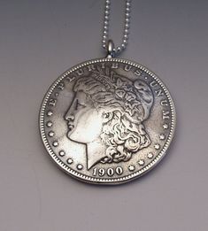 Silver Lady Dollar Pendant made from US Morgan Dollar Coin Vintage Silver Coin Jewelry, Heirloom Silver Coin Jewelry, Vintage Sterling Silver Coin Jewelry, Vintage Antique Silver Coin Jewelry, Handmade Antique Round Coin Necklace, Silver Coin Shaped Stamped Jewelry, Antique Round Coin Necklace Nickel Free, Vintage Sterling Silver Coin Necklace In Silver, Unique Silver Coin-shaped Jewelry