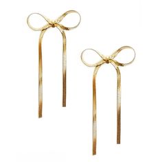 Introducing the Irene Bow Earrings, the perfect addition to any accessory collection. These trendy earrings feature a stylish bow design and are available in silver and gold.• Length: Approx 2.5"• 18k Gold plated stainless steel• Waterproof• Non-tarnishing• Hypoallergenic Silver And Gold Jewelry, Bow Earrings, Custom Name Necklace, Bar Bracelets, Trendy Earrings, Gold Ribbons, Bow Design, Silver And Gold, Long Earrings