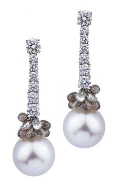 Our delicate 18K White Gold South Sea Pearl Diamond Earrings are an expertly crafted jewelry-box essential. These stunning earrings feature a combination of precious 18K white gold with round pearl and round brilliant cut Diamonds for an elegant addition to your style. Luxury High Luster Pearl Earrings, Pearl High Jewelry, Exquisite White Diamond Earrings For Evening, Luxury Platinum Pearl Earrings For Formal Occasions, Elegant Pear Shaped Diamond Cut Earrings, Formal White Gold Pear Shaped Earrings, Formal White Gold Pear Earrings, Fine Jewelry White Pear Diamond Earrings, Luxury Formal Earrings With Single Cut Diamonds