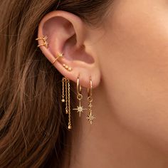 The stars shower around you when you have these earrings on! 18k gold plated, 18k rose gold plated, or rhodium plated over brass Cubic zirconia stones Sterling silver posts and butterfly backings