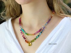 This colorful necklace features breathtakingly gorgeous precious gemstones in a rainbow color palette! Signature Valltasy necklace design. Here I have wire wrapped the most stunning, clear, AAA quality gemstones, in different, fancy, rare shapes. Incredible, one of a kind gemstones – each one is a small perfection! Just look at the amazing Swiss Blue Topaz [...] Rainbow Color Palette, Multi Gemstone Necklace, Colorful Necklace, Pink Topaz, 14k Gold Necklace, Summer Necklace, Amethyst Beads, Pink Amethyst, Rainbow Color