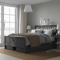 HEMNES bed frame with 4 storage boxes, dark gray stained/Lyngör white, Queen. HEMNES bed frame is a timeless beauty in solid wood with storage drawers that keep things close by – and LYNGÖR mattress base gives extra height and helps your mattress keep its shape for longer. Leg/ Headboard/ Bedside/ Top rail/ Middle rail: Solid pine. Black Wood Bed Frame, Warming Blanket, Ikea Hemnes Bed, Black Beds, Hemnes Bed, Bed Frame Legs, Headboard Bedroom, Black Bed Frame, Black Bed