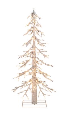 a white christmas tree with lights on it