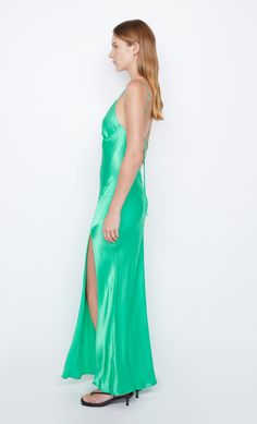 A statement eventwear style, the BEC + BRIDGE Ren Split Maxi Dress is cut on the bias from a lustrous speciality fabric. The dress features a thigh-high split, binding at bust, and fabric rouleau straps that feed through loops and finish at a low-cut, cross-back. This garment is certified Australian Made. Bec Bridge, Split Maxi Dress, Prom Dress Shopping, Under Dress, End Of Season Sale, Brides And Bridesmaids, Thigh High, Low Cut, Long Tops