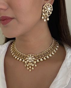 Discover the timeless elegance of our SoniGal Kundan Necklace, a stunning piece that effortlessly blends traditional Indian craftsmanship with modern sophistication. This lightweight necklace features exquisite Kundan stones that catch the light beautifully, making it the perfect accessory for any occasion, from casual outings to formal events. Key Features: Versatile Design: Perfect for pairing with both Indian and Western outfits, this necklace is a must-have addition to your jewelry collection. Lightweight Comfort: Enjoy all-day wear without the weight, making it ideal for long events or daily styling. Handcrafted Quality: Each piece is meticulously crafted to ensure you receive a unique work of art that embodies elegance and grace. Why You'll Love It  This Kundan necklace is not just j Light Weight Kundan Necklace, Elegant Temple Jewelry Kundan Necklace, Elegant Kundan Jewelry With Intricate Design, Elegant Chandbali Bridal Necklace Hand Set, Elegant Chandbali Bridal Necklace, Elegant Chandbali Bridal Necklace For Formal Occasions, Formal Kundan Necklace With Tilla, Elegant Heavy Bridal Necklace, Festive Elegant Tilla Necklace