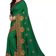 Beautiful Embroidered Saree For Women Style Code - Embroidery Silk Saree Pattern - Embroidered Pack Of - 1 Color - Green/Gold Occasion - Wedding, Party & Festive Type Of Embroidery - Aari Bharat Work Hand Embroidery - Yes Decorative Material - Mirror, Decorative Stones, Lace Embroidery Method - Hand Construction Type - Embroidered Fabric Care - Dry Clean Only Other Details This Beautiful Traditional Sari Is Elegantly Decorated With Gorgeous Embroidery And Pattern That Gives A Perfect Look To The Semi-stitched Bollywood Blouse Piece With Embroidered Border, Bollywood Style Embroidered Art Silk Choli, Unstitched Choli With Embroidered Border For Diwali, Bollywood Style Art Silk Choli With Embroidered Border, Bollywood Style Semi-stitched Choli With Embroidered Border, Green Floral Embroidered Traditional Wear For Diwali, Green Traditional Wear With Floral Embroidery For Diwali, Diwali Floral Embroidery Choli In Chinon, Fitted Blouse Piece With Embroidered Border For Puja