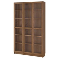 a wooden bookcase with glass doors and shelves