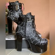 Brand New, In Original Box, Never Worn, Us 10 Black Synthetic Boots For Halloween, Black Gothic Synthetic Heels, Black Gothic Heels With Closed Toe, Gothic Black Closed Toe Heels, Black High Heel Boots For Halloween, Black Gothic Heels For Evening, Gothic Black Heels For Evening, Gothic Black Evening Heels, Black Punk Heels For Halloween