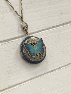 Butterfly 🦋 vintage antique brass Locket Pendant - hand painted. Butterfly is the power of air, the ability to float upon a breeze. It is known for its darting flight; thus, it represents the mind and our ability to change it when necessary. Butterfly represents the never-ending cycle of life; therefore, its medicine bestows not only the ability, but the clarity of mind needed before self-transformation. Butterflies appear to dance as they flitter among the flowers. They remind us not to take t Vintage Locket Necklace Victorian, Butterfly Locket, Hand Painted Butterfly, Locket Necklace Vintage, Painted Butterfly, Vintage Locket, Birthday Mom, Vintage Lockets, Photo Locket